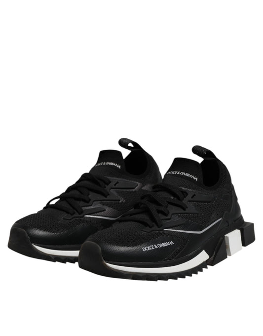 Black athletic shoes with white soles