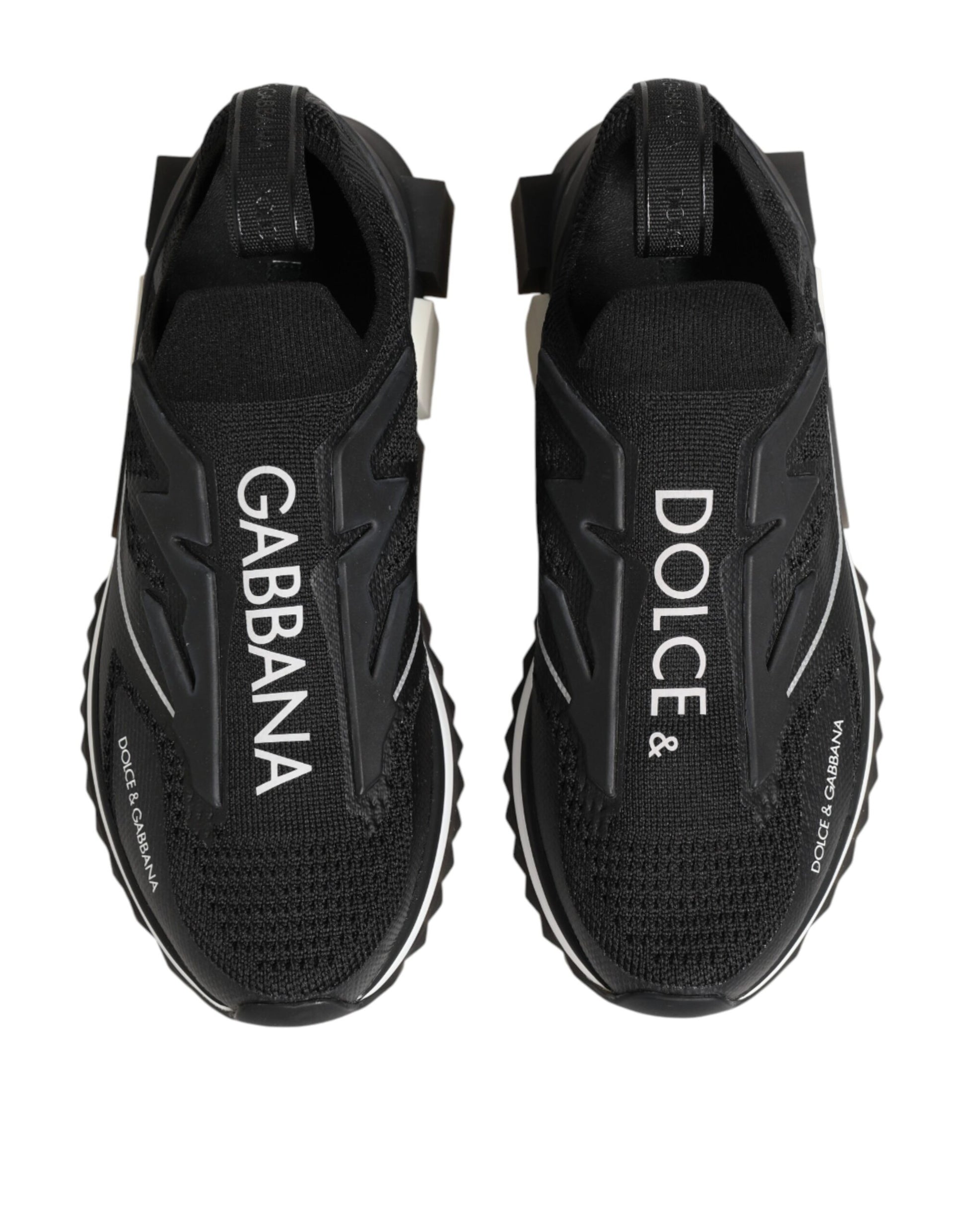 Black sneakers with white brand names on side
