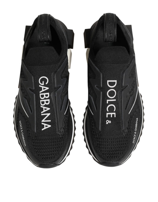 Black sneakers with white brand names on side