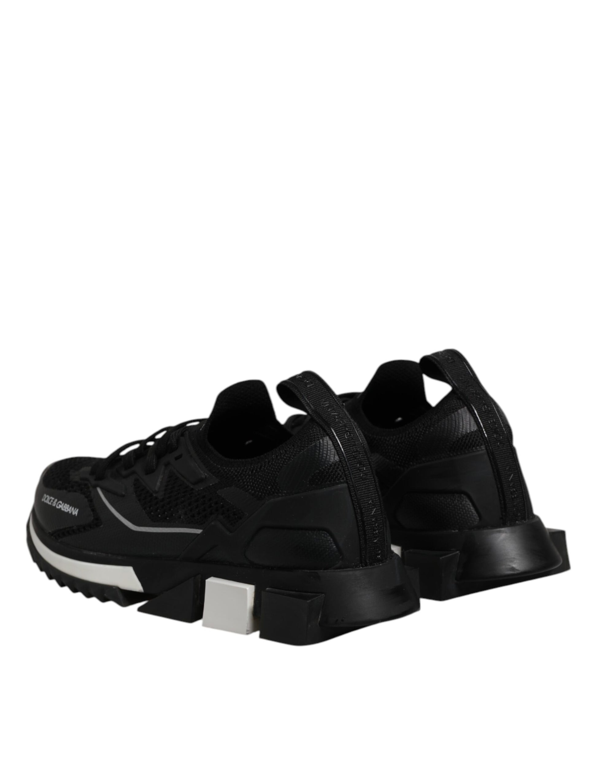 Black athletic shoe with white sole