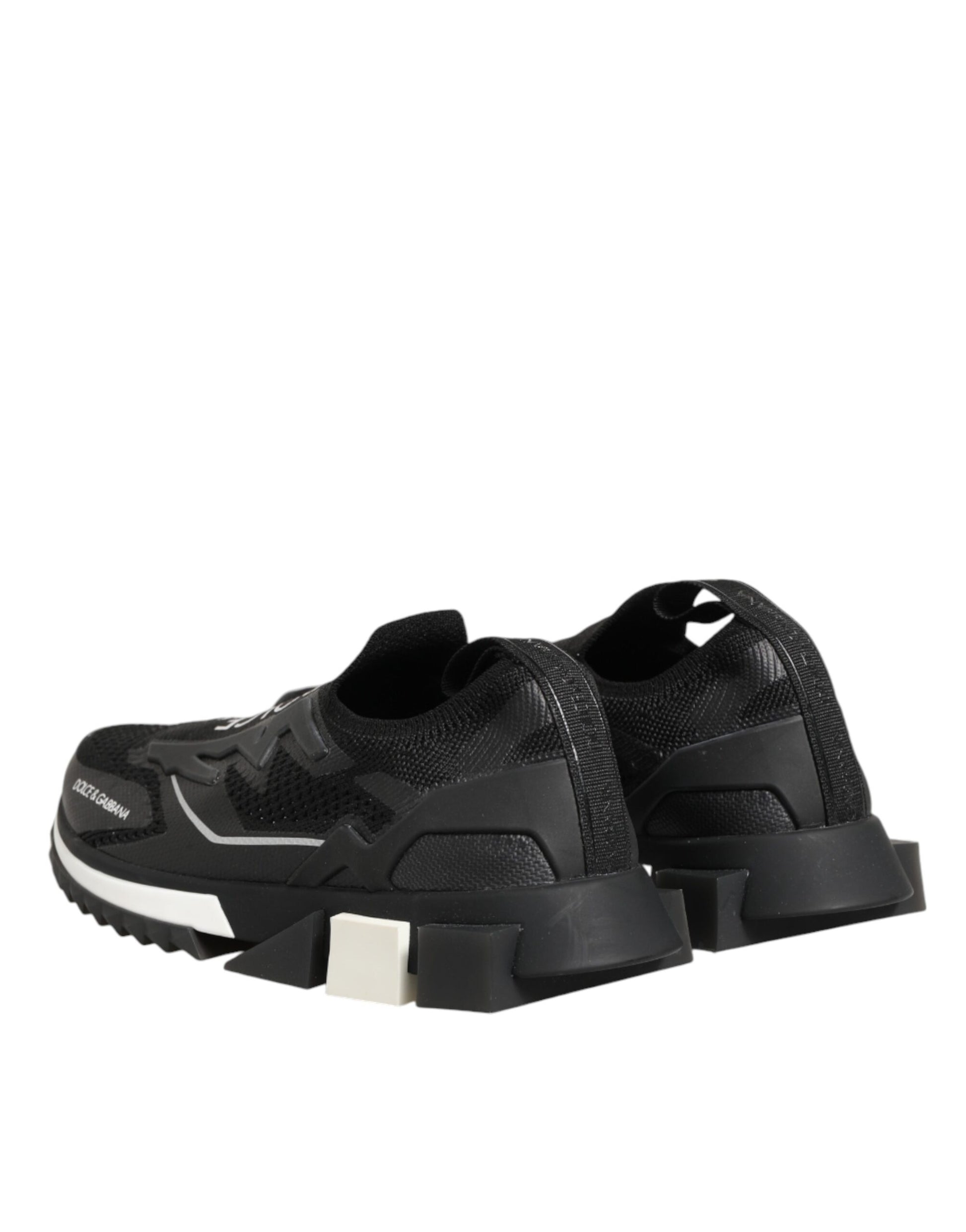 Black athletic shoe with white sole
