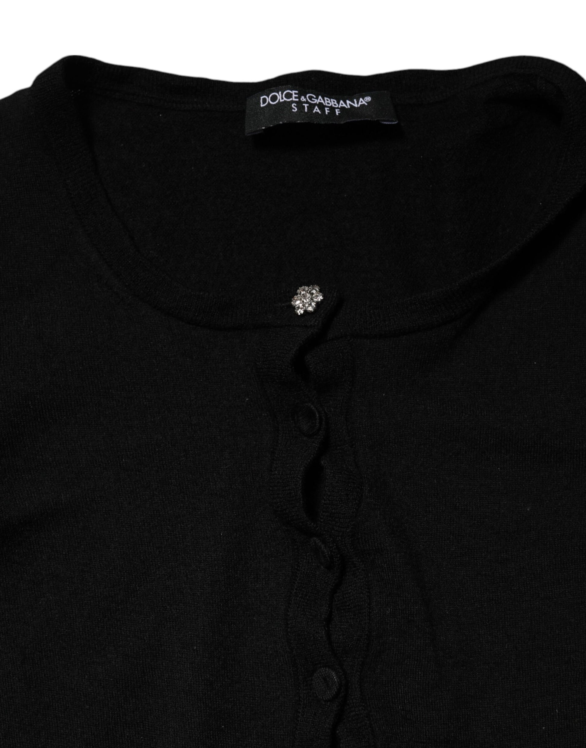 Black sweater with ribbed neckline and cuffs