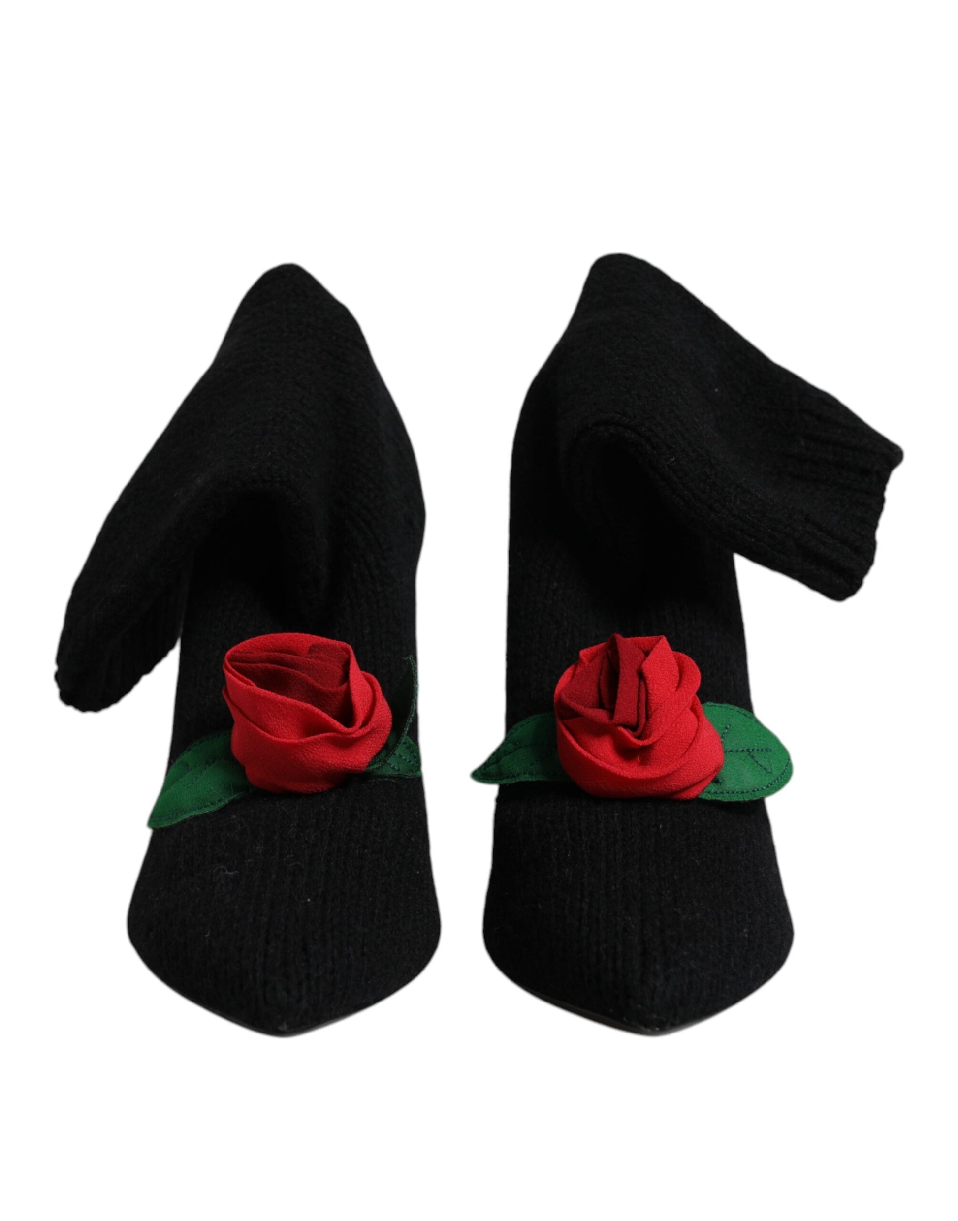 Pair of black gloves with red roses on wrists
