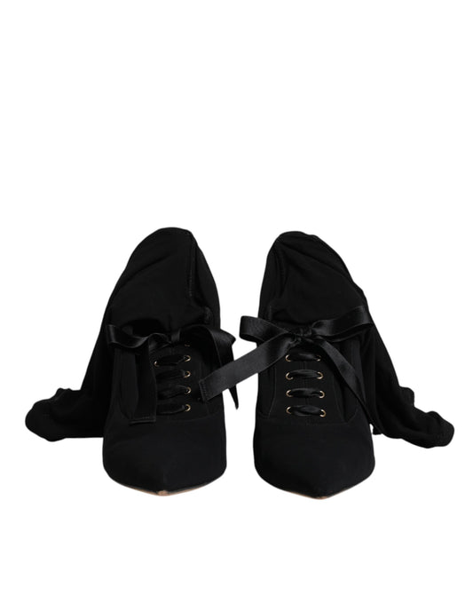 Pair of black ballet flats with ribbon laces