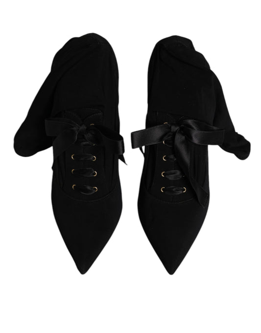 Pair of black ballet flats with lace trim