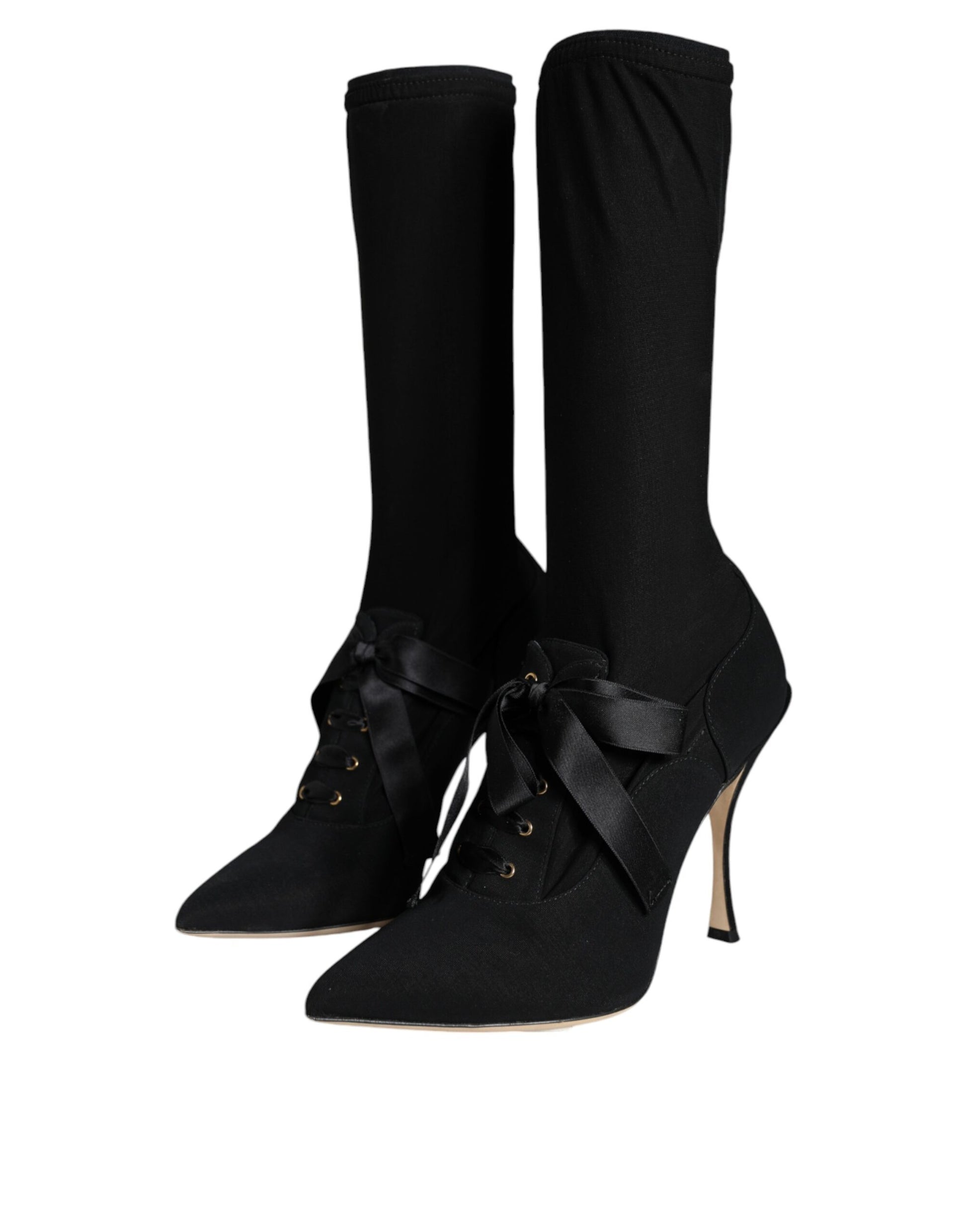 Pair of black knee high boots with heels
