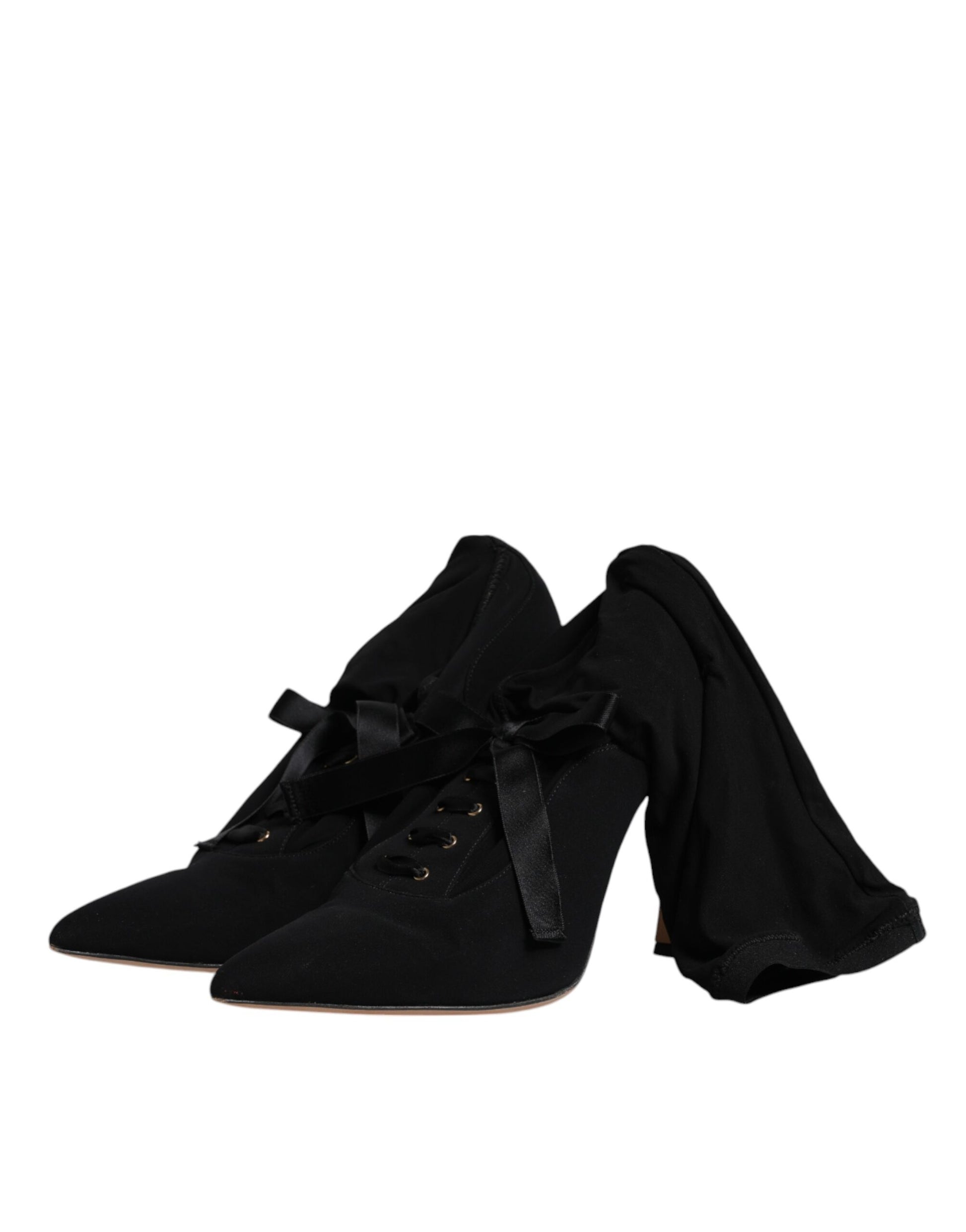 Pair of black suede shoes with laces and bow detailing
