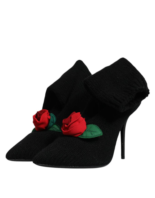 Black suede ankle boots with red rose embellishments on sides
