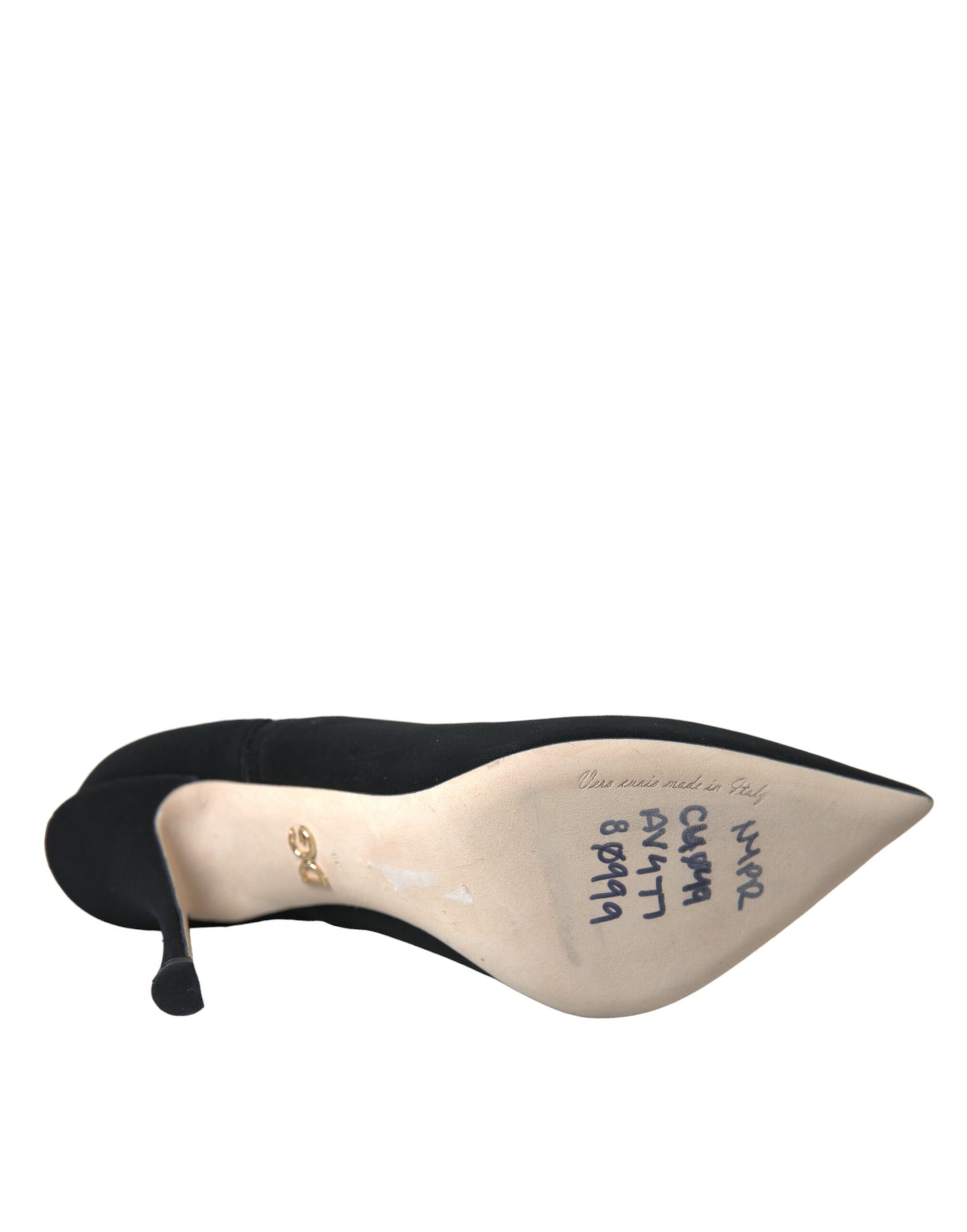 Black shoe with tan sole and heel