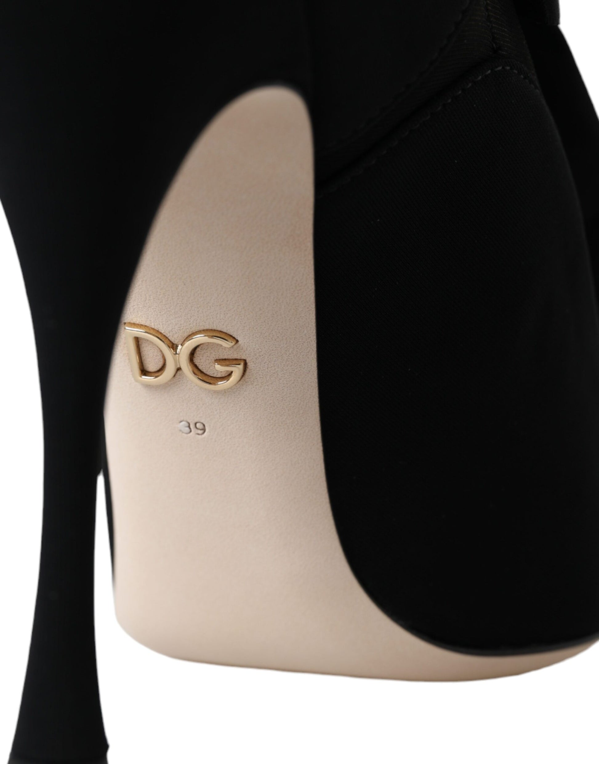 High heel shoe with a tan toe cap and black upper