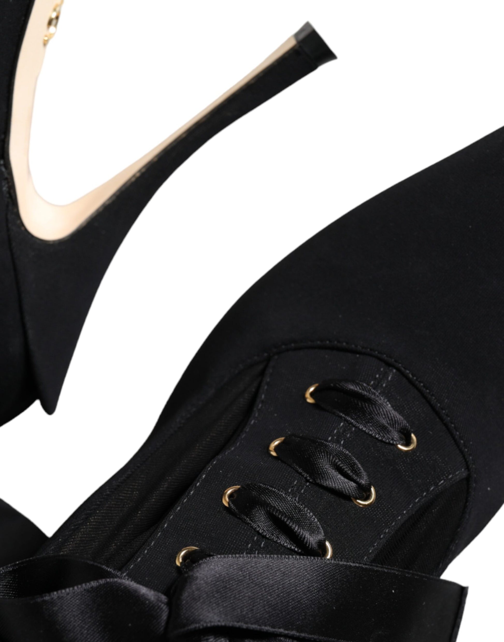Black high heel shoes with gold buckles