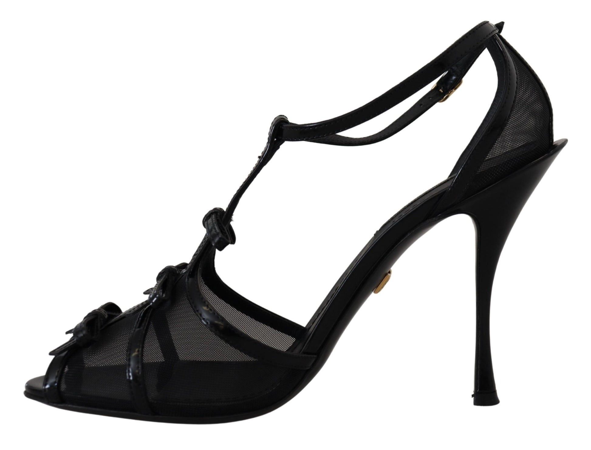 Black high heel shoe with strap detailing and a pointed toe