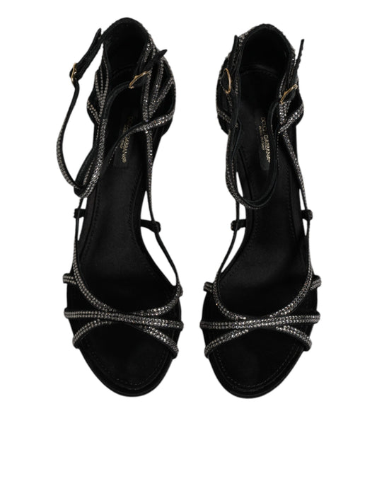 Pair of black high heel shoes with embellishments