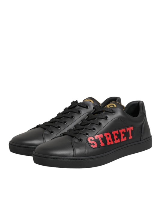 Black sneakers with red logo on side