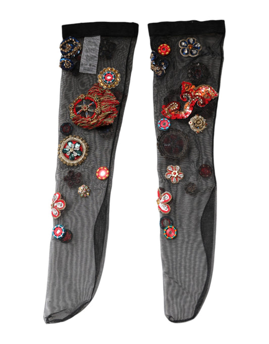 Pair of gray socks decorated with colorful embroidery