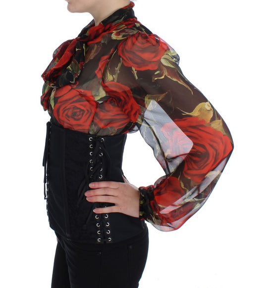 Woman wearing black corset and red floral shirt