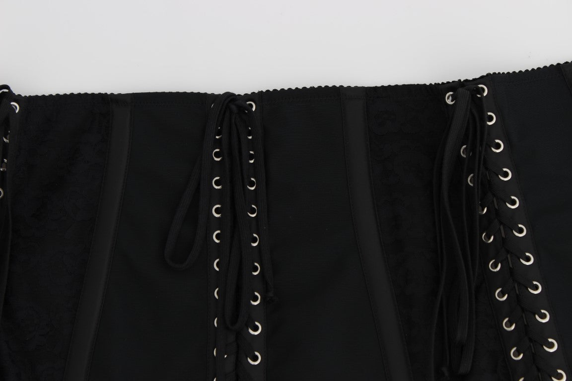 Black leather pants with silver studs and black laces