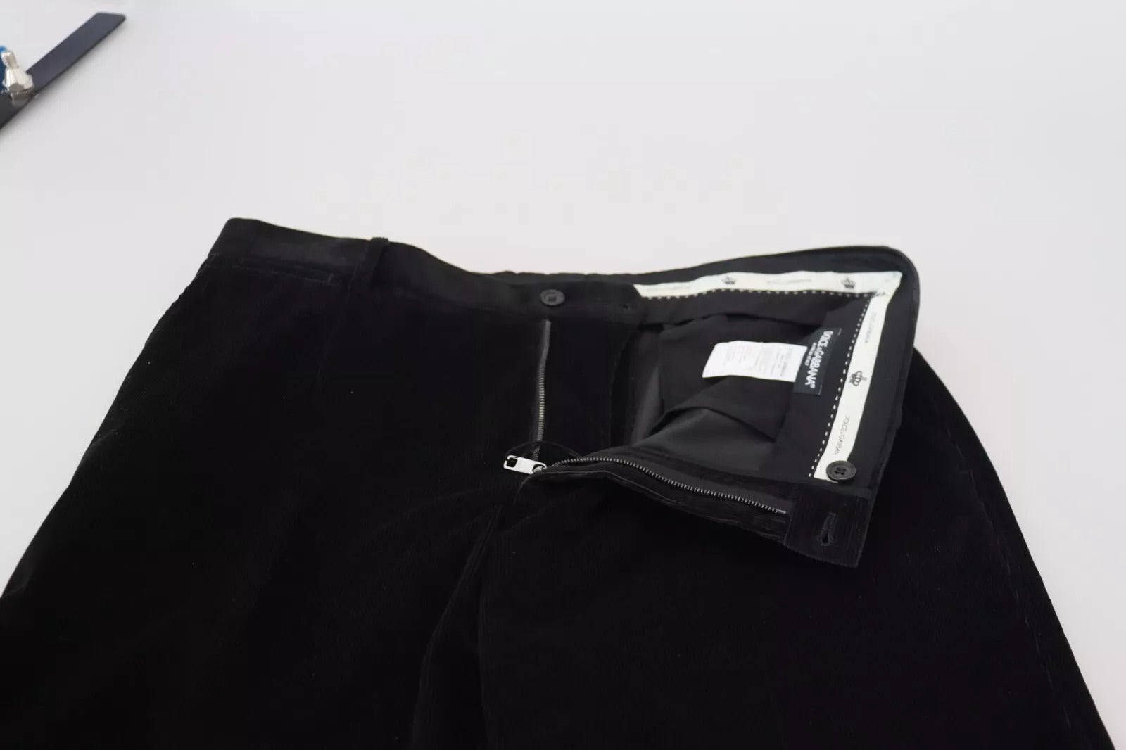 Black pants with a white stripe on the side