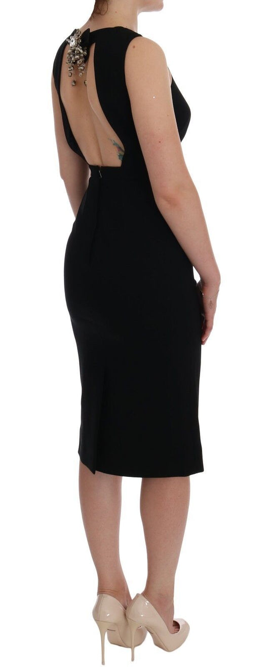 A black strapless dress with crystal embellishments on the bodice and skirt