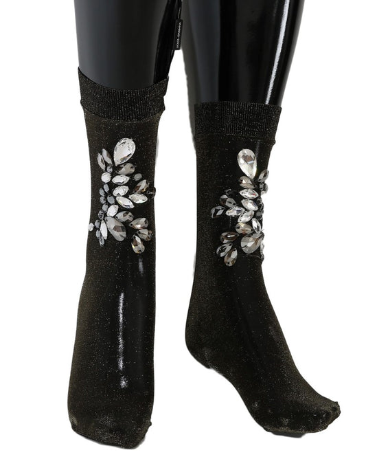 Black boots with glittery embellishments on legs
