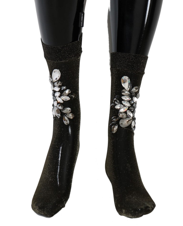 Black knee high boots with glittery embellishments on top