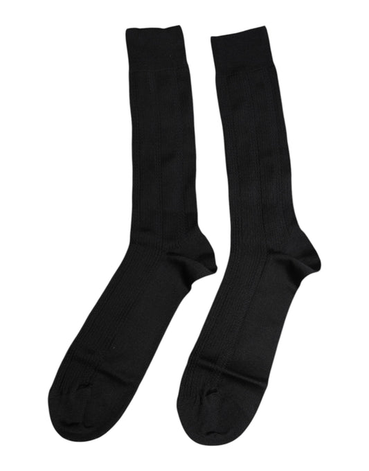Two black socks with white stripes