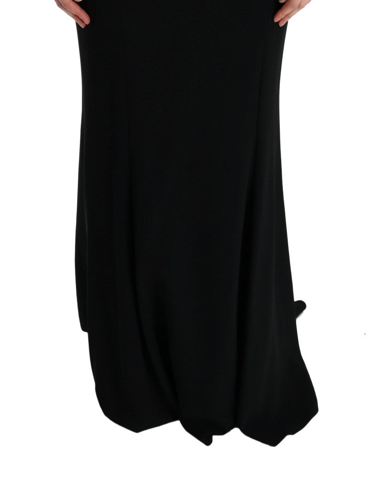 Long black dress with ruffles on sleeves