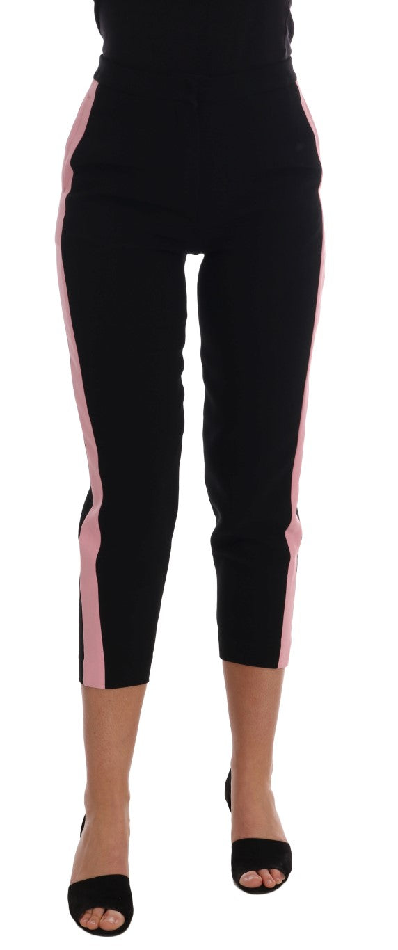 Pair of black leggings with pink stripe down side
