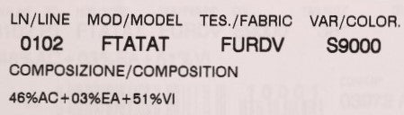 A label with various pieces of information about a product. It includes the model number, color code, and oth