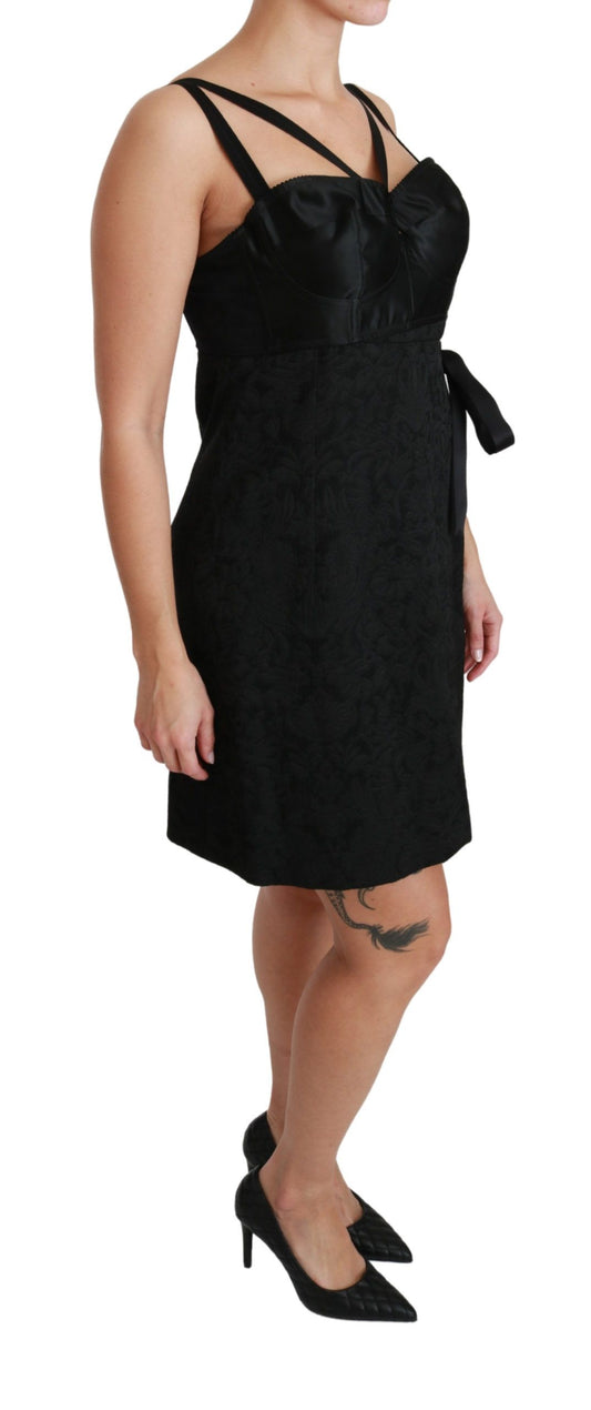 A black stretch satin jacquard mini dress with a halter neckline and ruched detailing