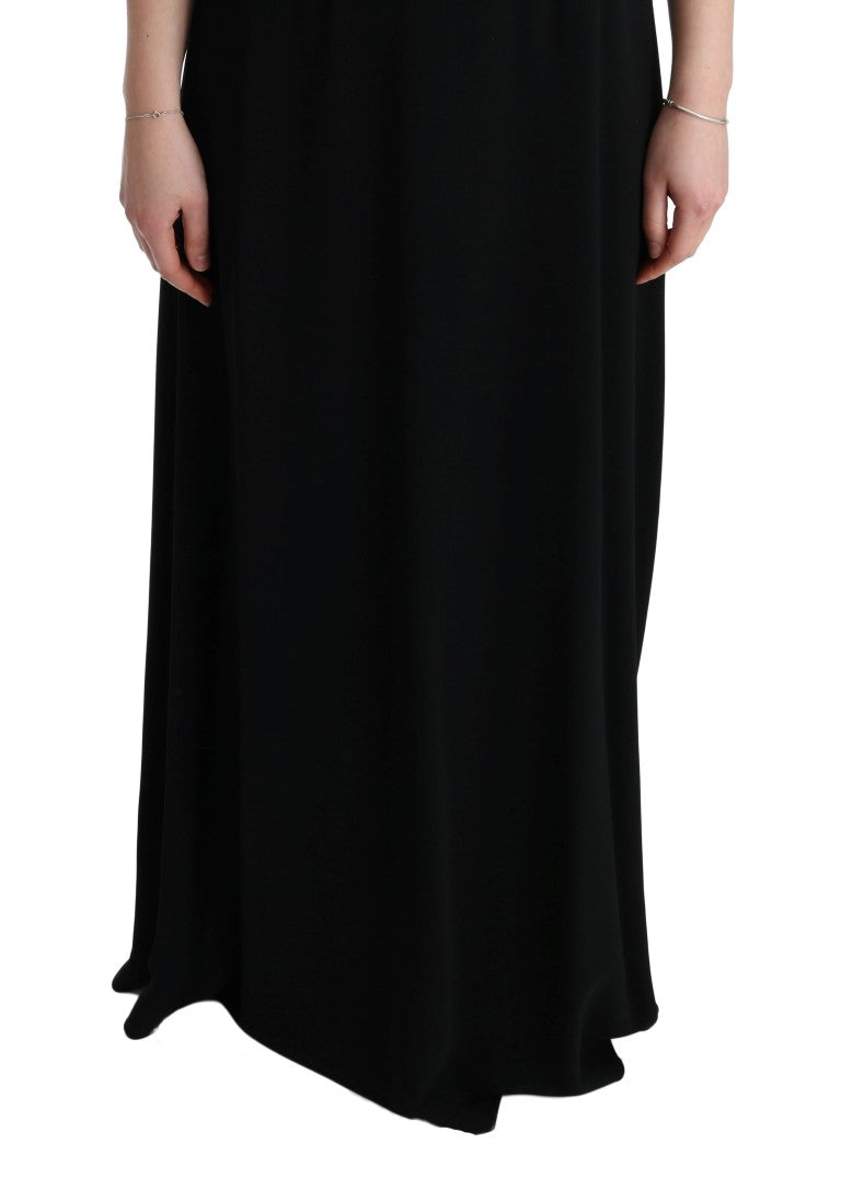 Long black dress with ruffles on sleeves