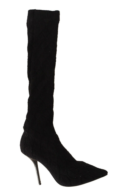 Black knee high boots with heels and pointed toe