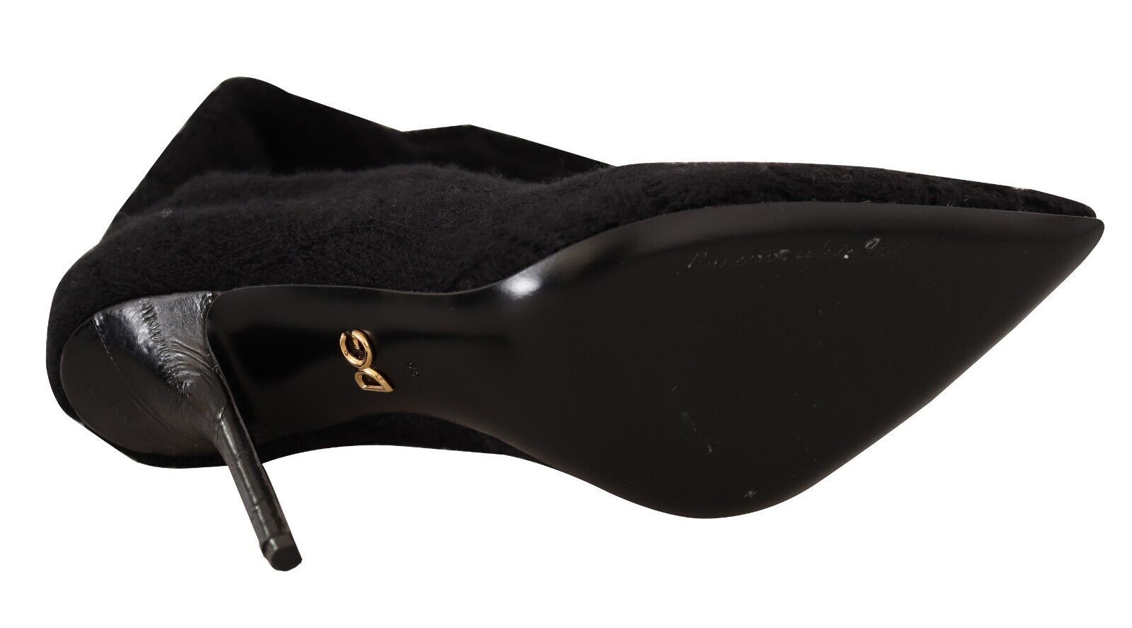 Black high heel shoe with pointed toe and stiletto heel