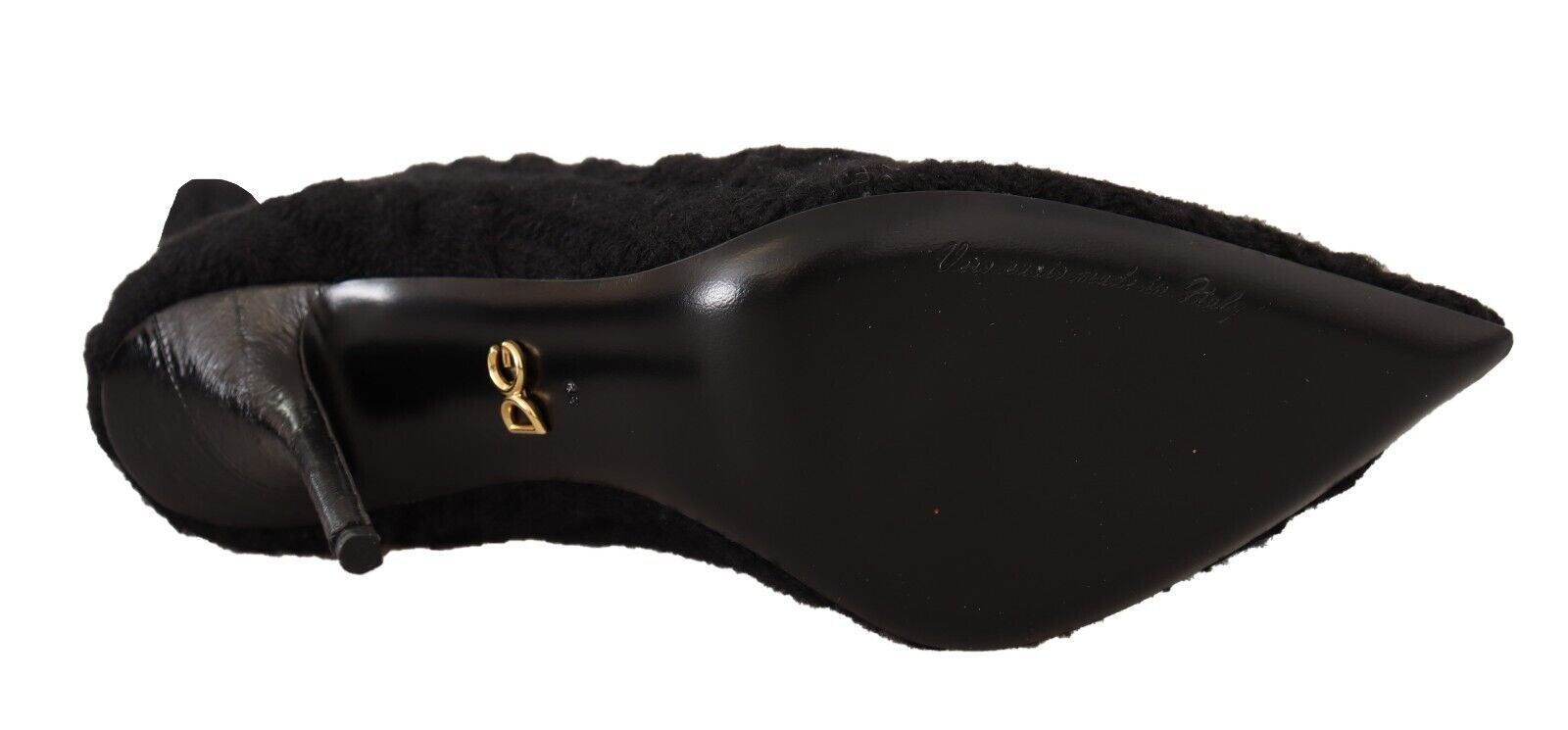 Black leather handbag with gold accents and a handle