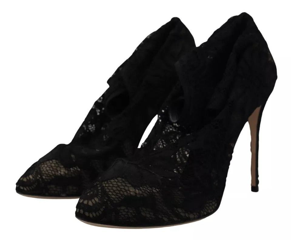 Pair of black high heel shoes with lace detailing
