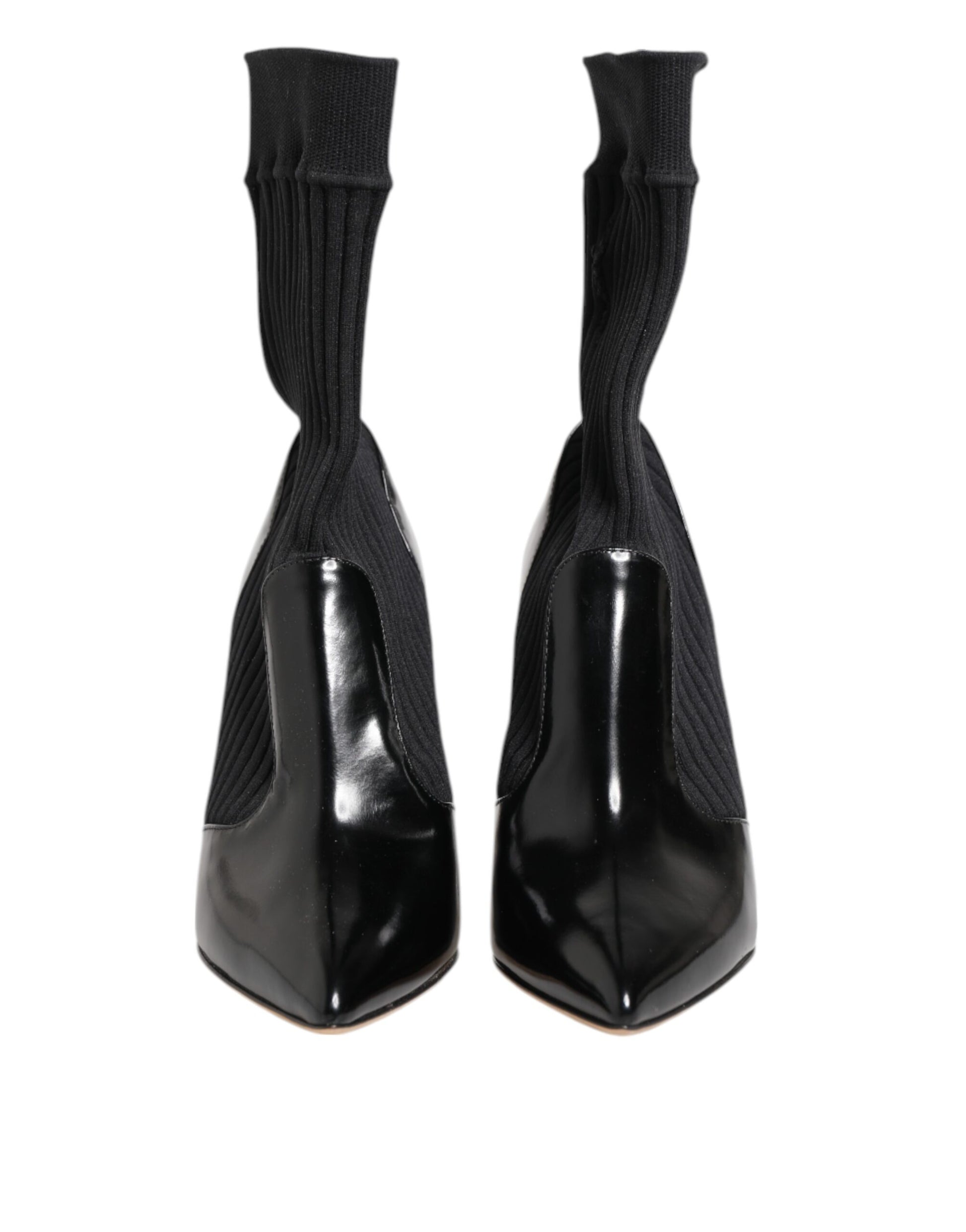 Pair of black knee high boots with elastic at top