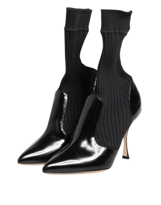 Black high heel boots with black socks