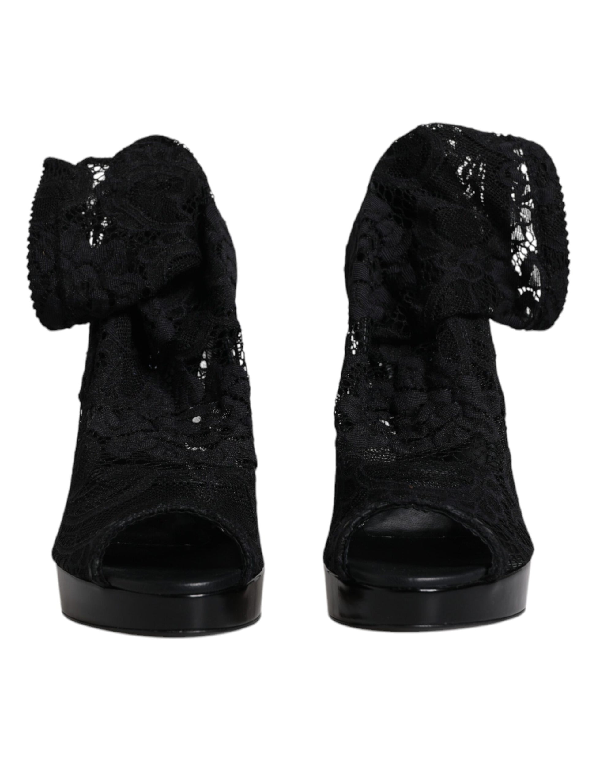 Pair of black high heel shoes with glittery detailing