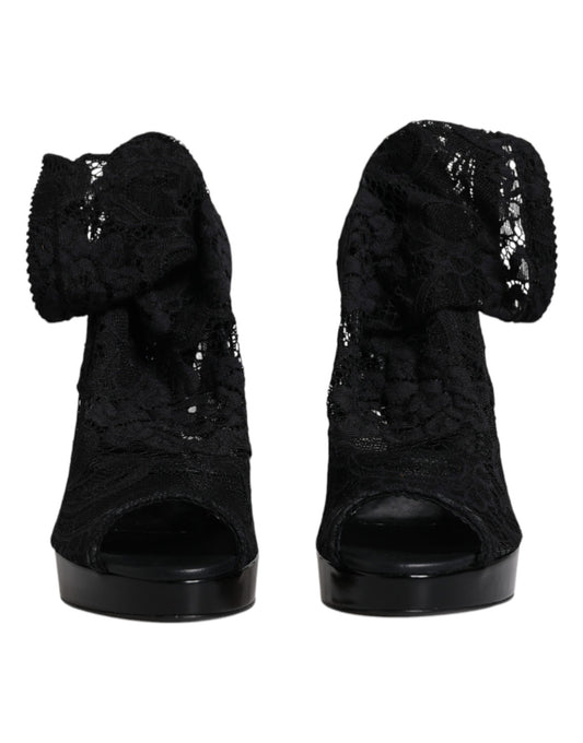 Pair of black high heel shoes with glittery detailing