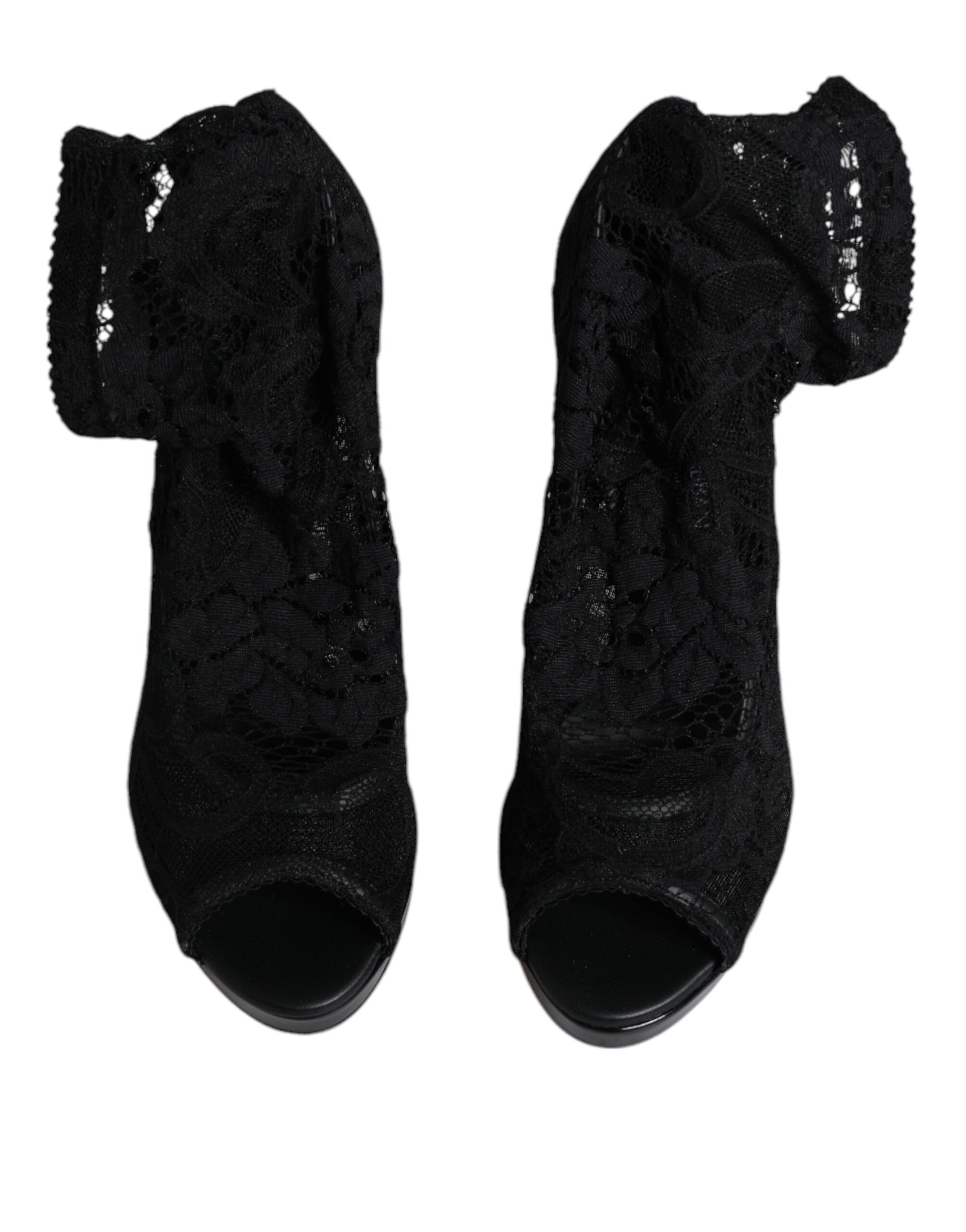 Pair of black high heel shoes with lace detailing