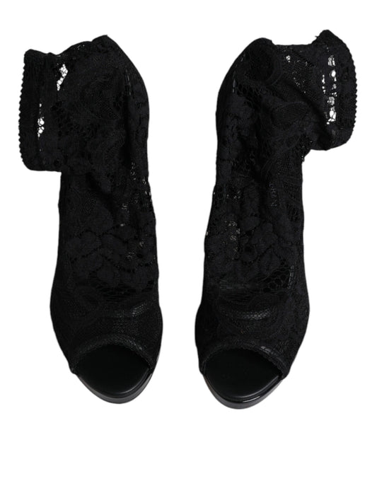Pair of black high heel shoes with lace detailing