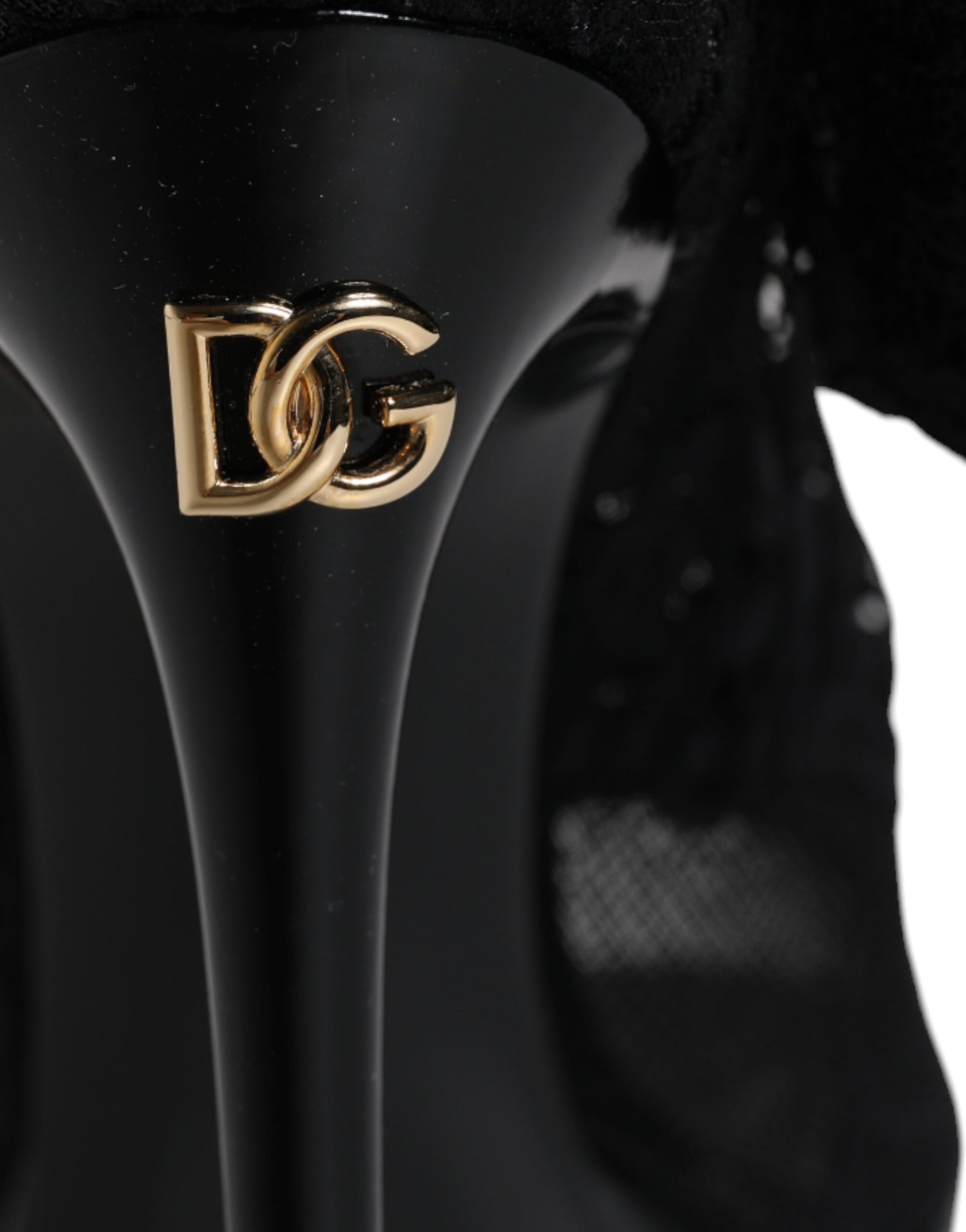 High heel shoe with gold logo on side