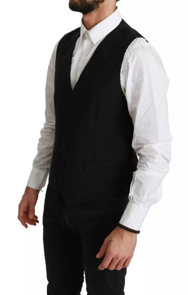 A black wool vest with a stretch waistband, part of a formal dress ensemble