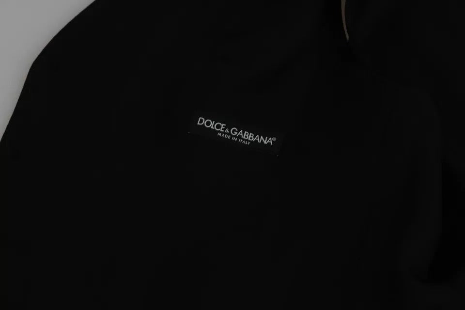 A black wool vest with a stretch waistband, featuring the Dolce & Gabbana logo