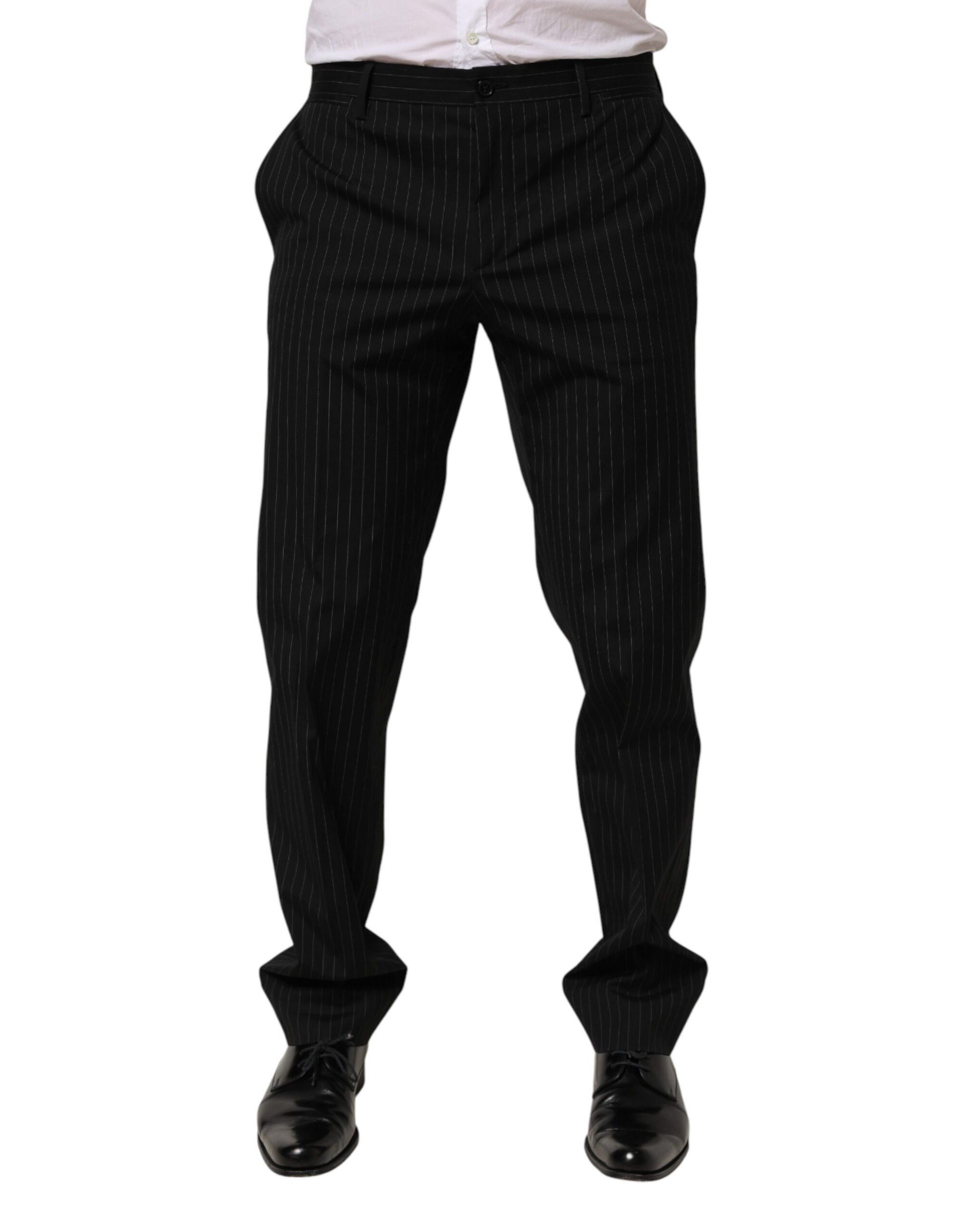 A pair of black striped dress pants from the brand Dolce & Gabbana. They are designed for formal men's wear a