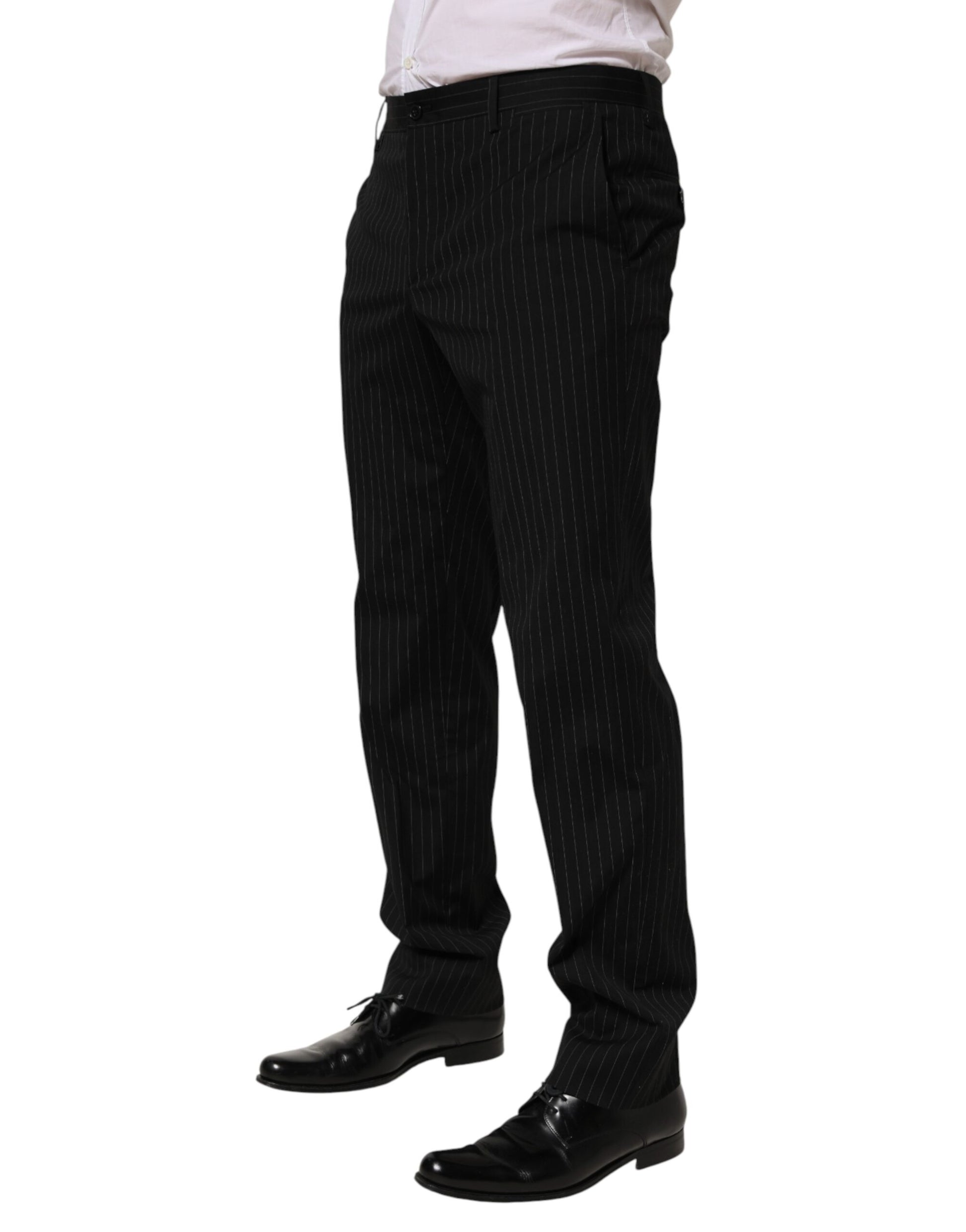 A pair of black striped men's trousers from the brand Dolce & Gabbana