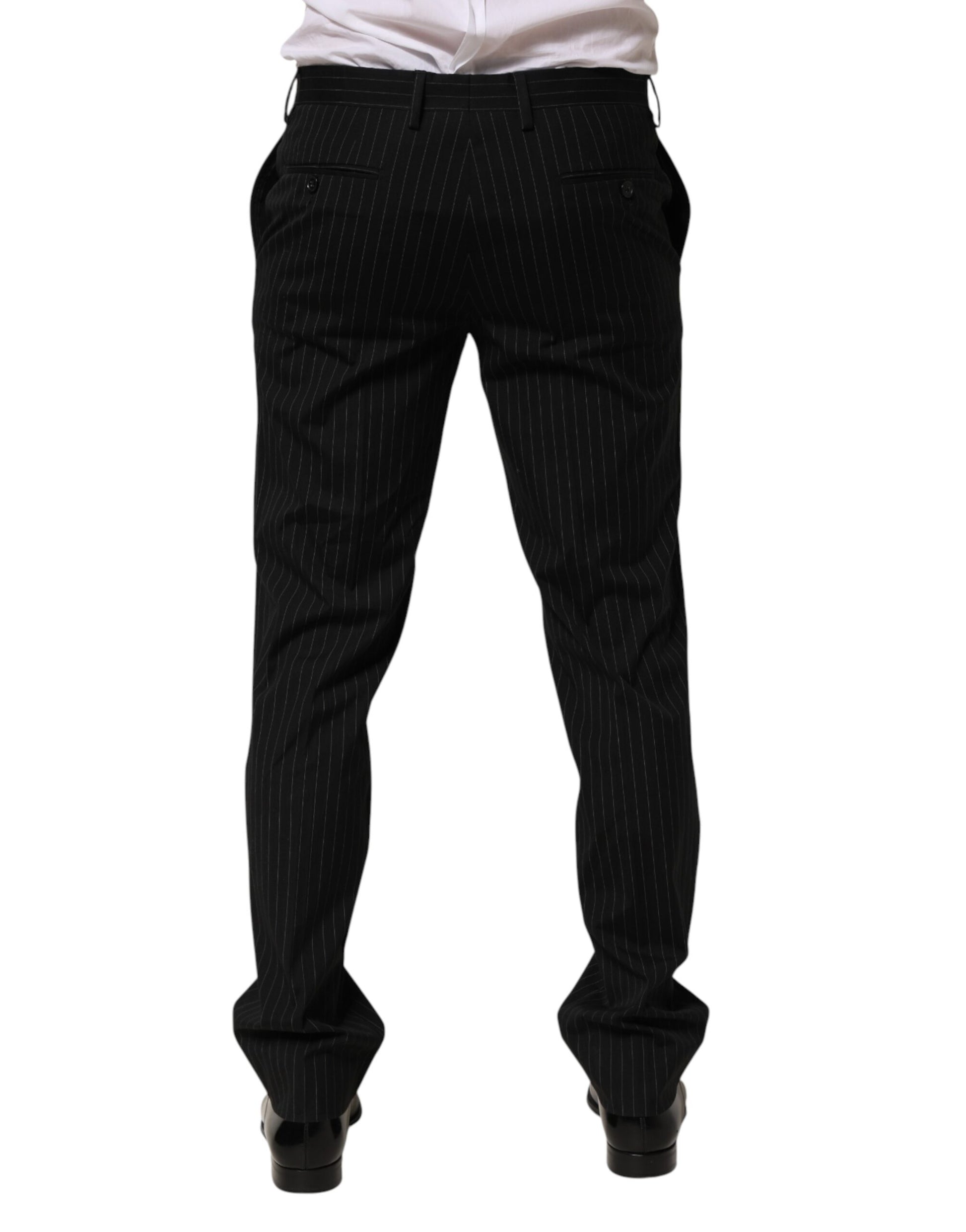 A pair of black striped men's trousers from the brand Dolce & Gabbana