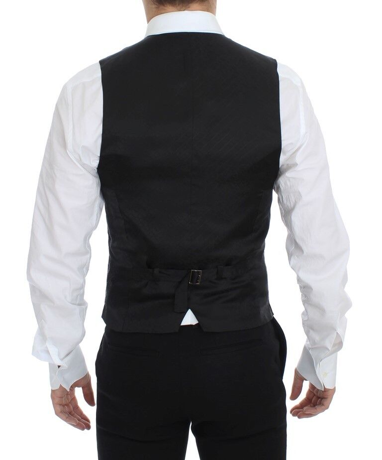 A black vest with white stripes, part of a suit or tailored outfit
