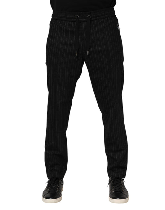 Pair of black pants with white stripes on sides