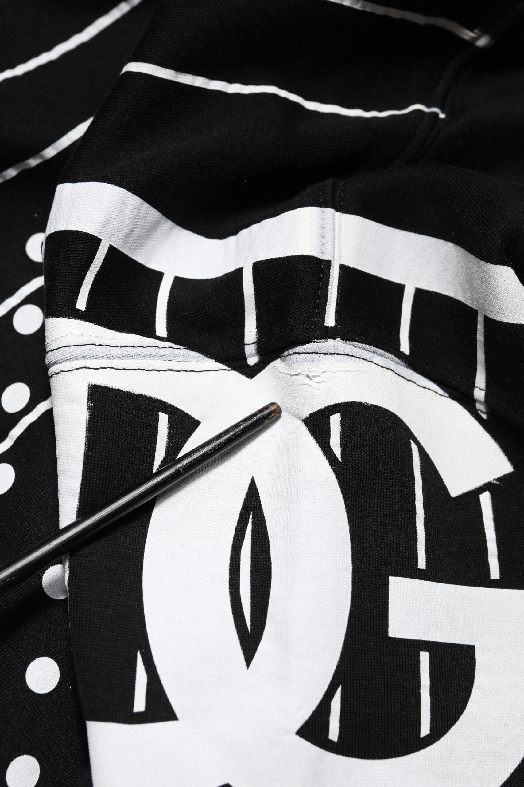 Black and white jacket with embroidered logo
